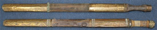A Tibetan Dao or sword, largest 32.5in. incl. scabbard